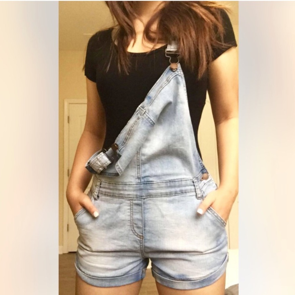 light-washed overalls